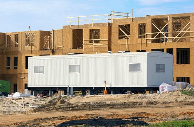 construction workers meeting at office trailers on rent in Driscoll